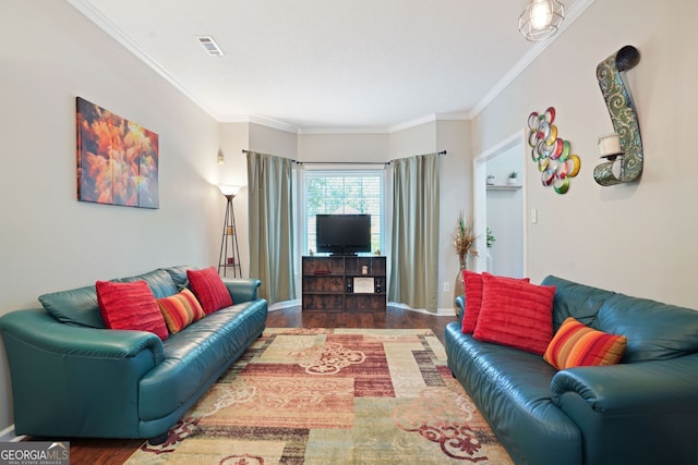 living room featuring crown molding and wood-type flooring