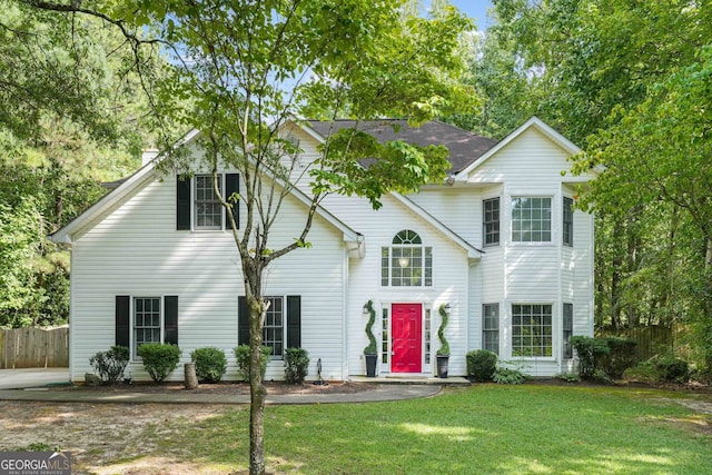 view of front of house with a front lawn