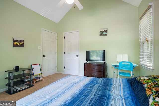 carpeted bedroom featuring multiple windows, ceiling fan, and high vaulted ceiling