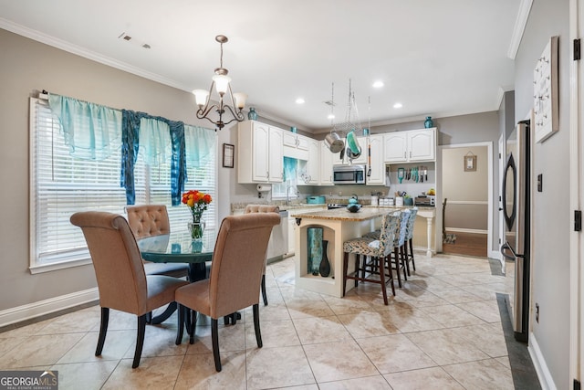 dining space with crown molding, light tile patterned floors, and an inviting chandelier