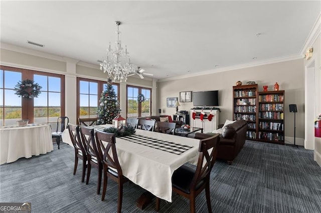 351 Washington Ave NE Ste 302, Marietta, GA 30060 - dining space with a notable chandelier, dark carpet, baseboards, ornamental molding, and visible vents