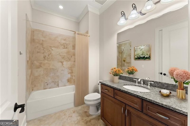 full bathroom with tiled shower / bath combo, tile patterned flooring, vanity, toilet, and crown molding