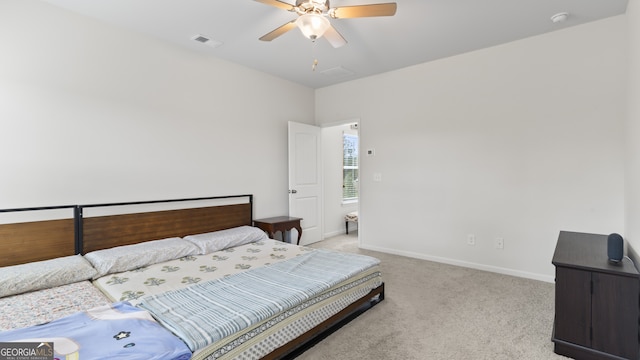 bedroom with light carpet and ceiling fan