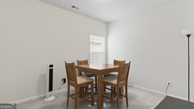 view of carpeted dining space