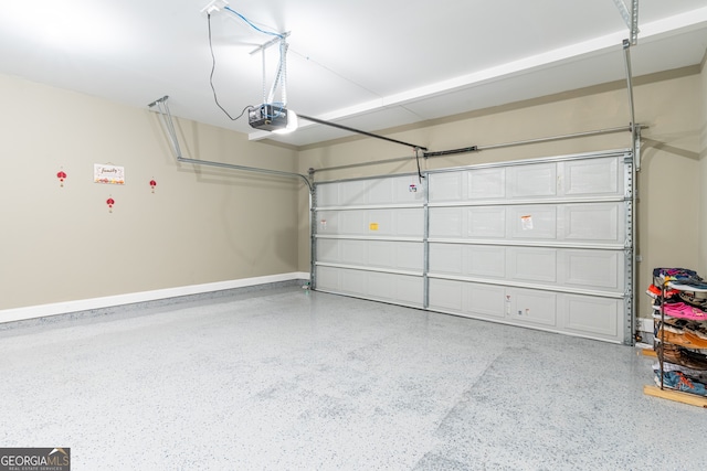 garage featuring a garage door opener