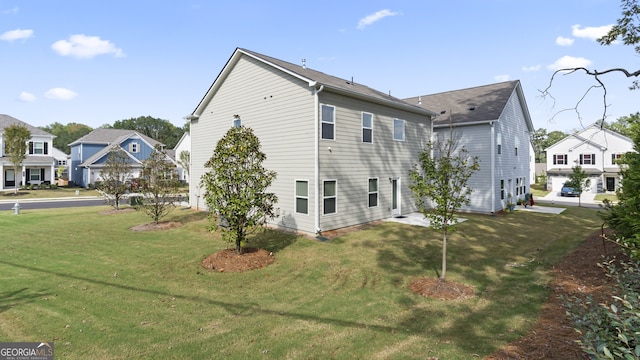 view of home's exterior with a yard