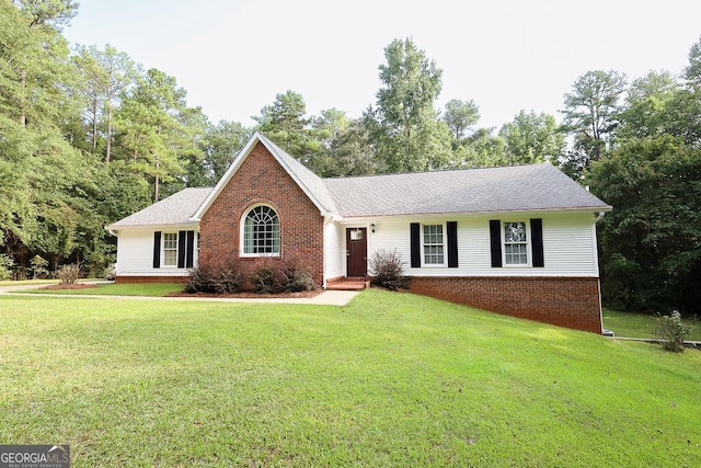 ranch-style house with a front lawn