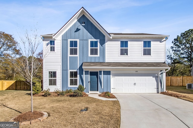 view of front of home featuring central AC, a garage, and a front lawn