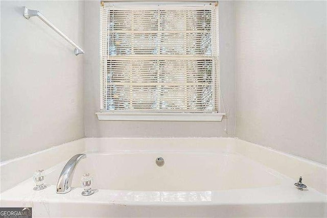 bathroom featuring a bathing tub