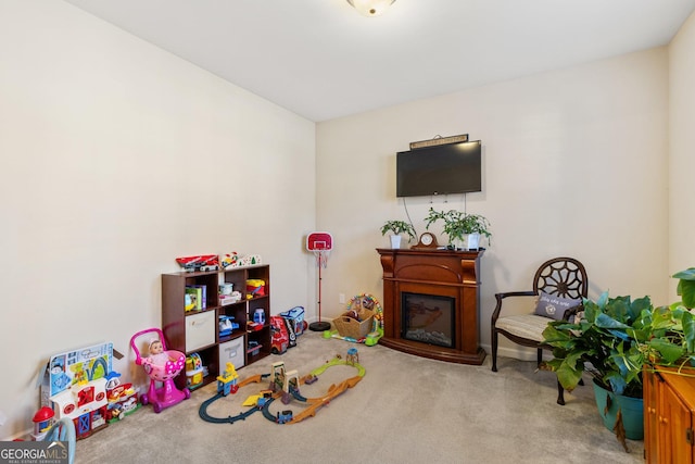 playroom with light colored carpet