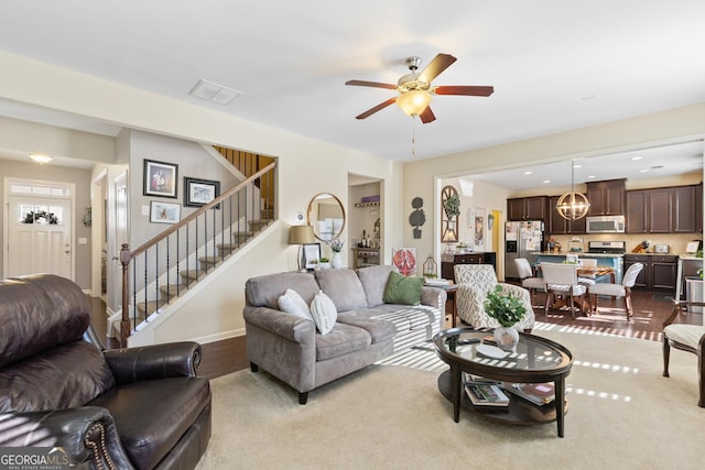 living room with ceiling fan