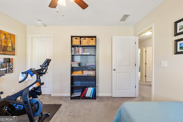 carpeted bedroom featuring ceiling fan