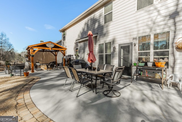 view of patio / terrace featuring a gazebo and grilling area