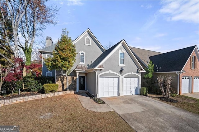 front of property with a garage