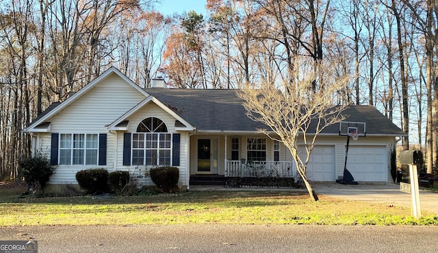 ranch-style home featuring a porch, a garage, and a front lawn