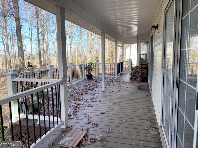 wooden deck featuring covered porch