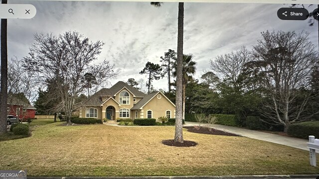 view of front of house with a front yard