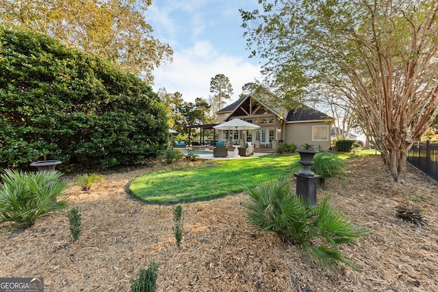 view of yard with a gazebo and a patio area