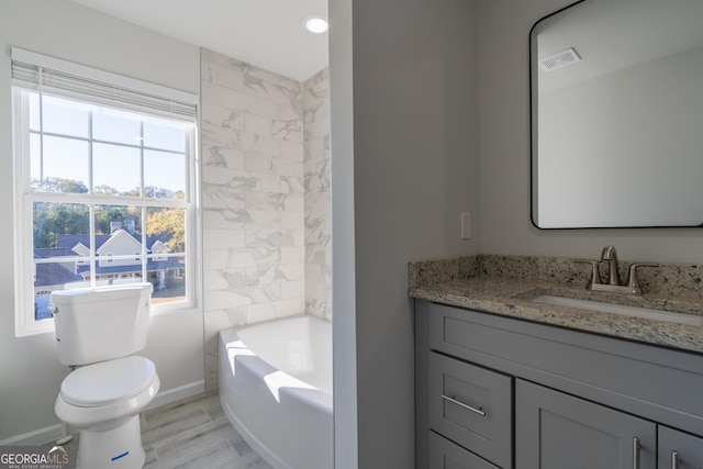 full bathroom with hardwood / wood-style floors, vanity, a healthy amount of sunlight, and toilet