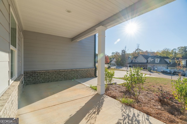 view of patio with a residential view