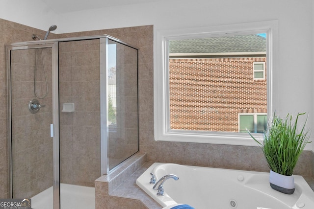 kitchen with decorative backsplash, sink, a kitchen island, and light wood-type flooring