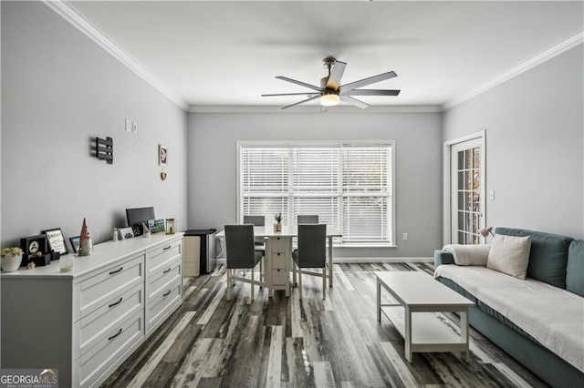 living room with crown molding, ceiling fan, and dark hardwood / wood-style flooring