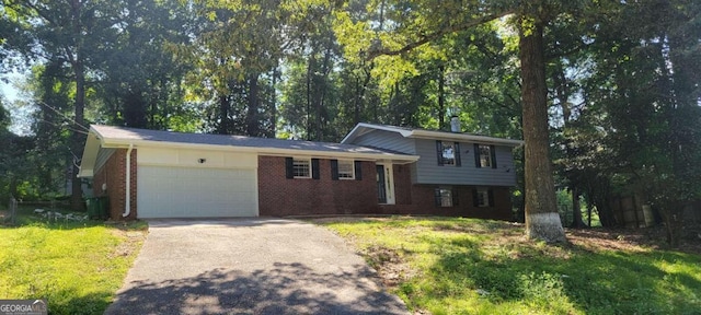 tri-level home featuring a front lawn and a garage