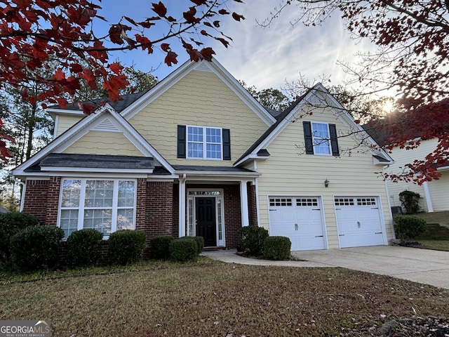 view of front of property featuring a garage