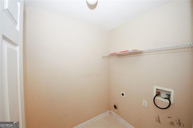 clothes washing area featuring hookup for an electric dryer and washer hookup