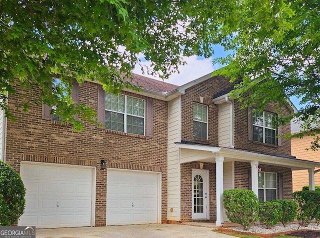 view of front of property featuring a garage