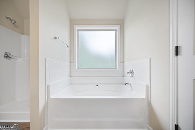 2275 Lovejoy Rd Lot 72, Hampton, GA 30228 - bathroom with a bath and a shower