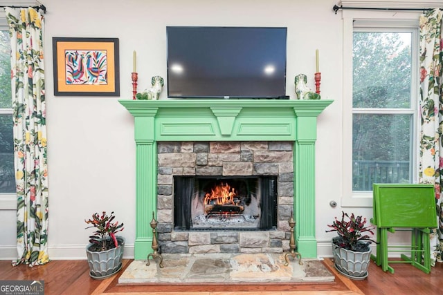 interior space featuring a fireplace and hardwood / wood-style flooring