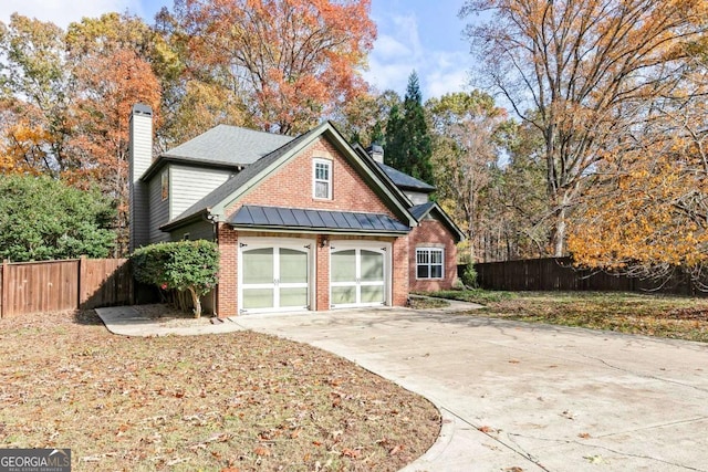 view of home's exterior with a garage