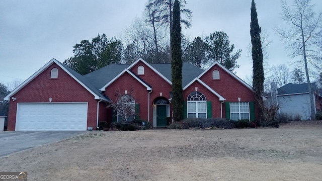 front facade with a garage