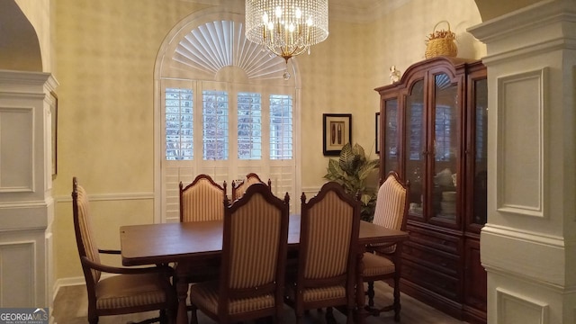 dining space featuring a chandelier