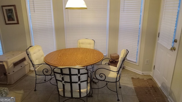 dining room with tile patterned flooring