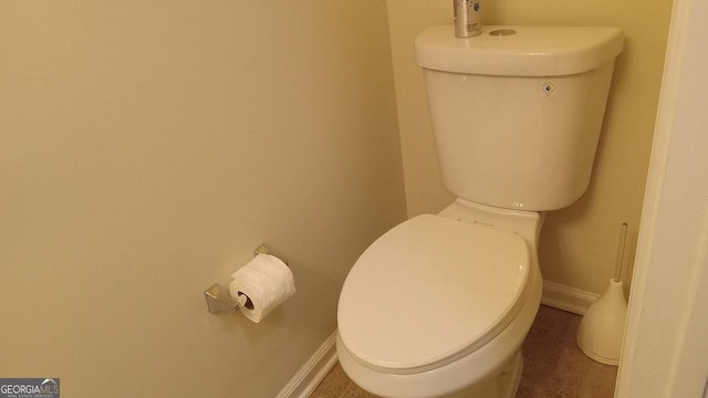 bathroom featuring toilet