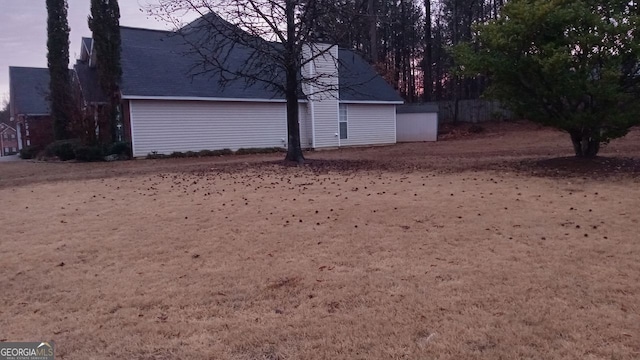 view of property exterior at dusk