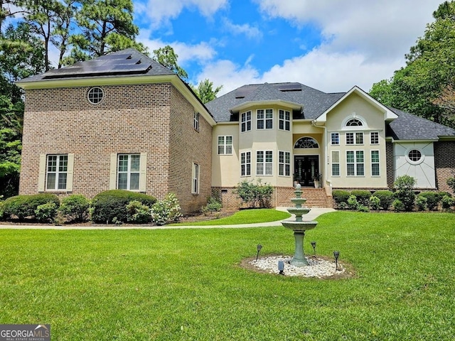 view of front of property with a front yard