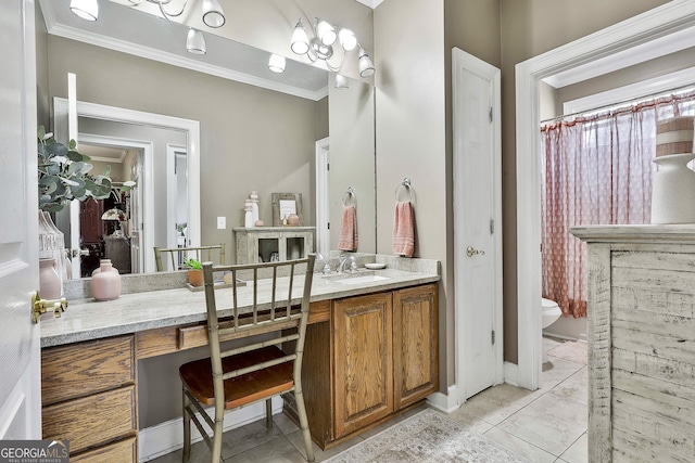 bathroom featuring tile patterned flooring, vanity, toilet, and crown molding