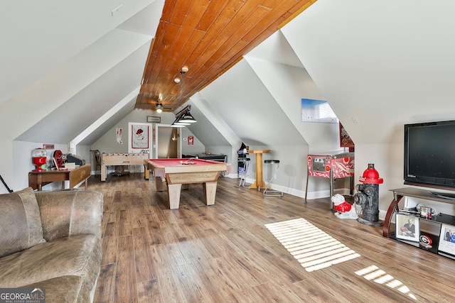 recreation room with hardwood / wood-style floors, pool table, and vaulted ceiling