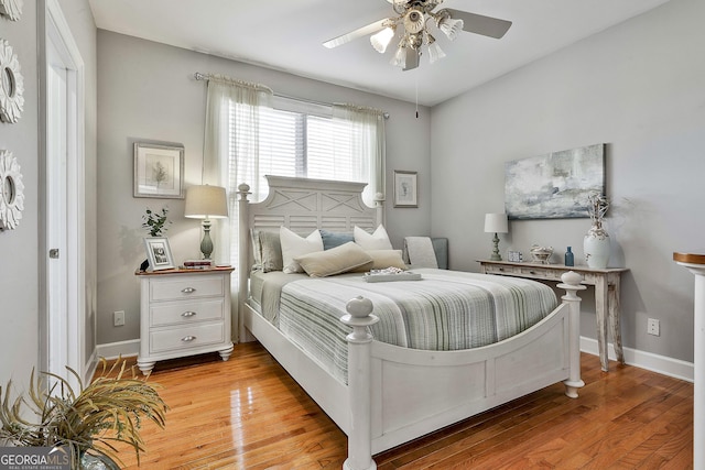 bedroom featuring ceiling fan and light wood-type flooring