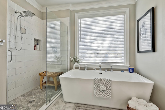 bathroom with separate shower and tub and crown molding