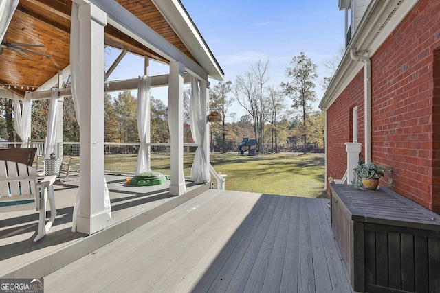 deck featuring a lawn