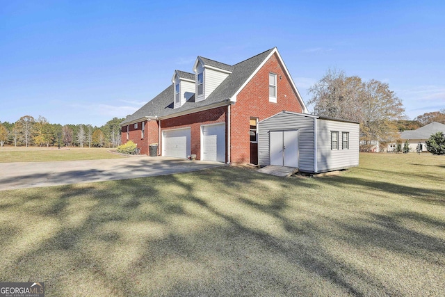 view of property exterior with a lawn, a shed, and a garage