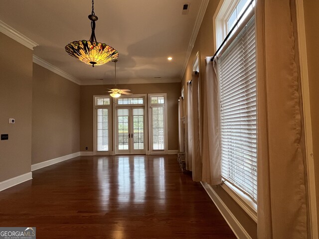 kitchen featuring kitchen peninsula, stainless steel appliances, sink, pendant lighting, and light hardwood / wood-style flooring