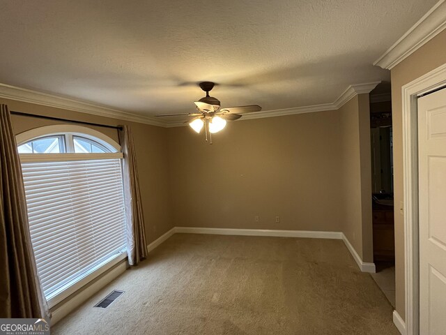 bathroom featuring toilet, tile patterned floors, and crown molding