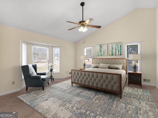 bedroom with vaulted ceiling, dark carpet, visible vents, and baseboards