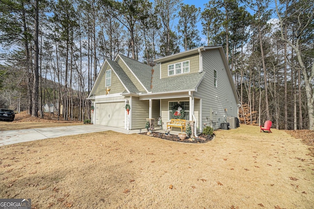 view of front of home featuring covered porch and a front yard