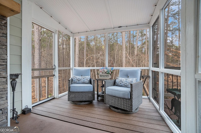 sunroom / solarium with lofted ceiling